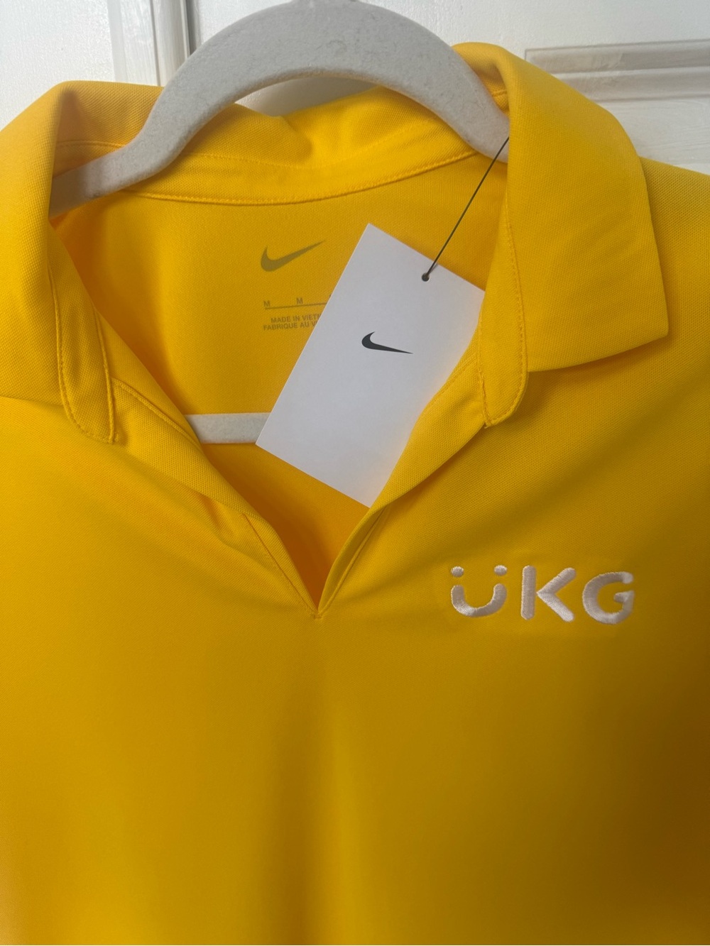 Nike Women’s Bright Yellow Polo w/ White UKG Ultimate Kronos Group Embroidery
